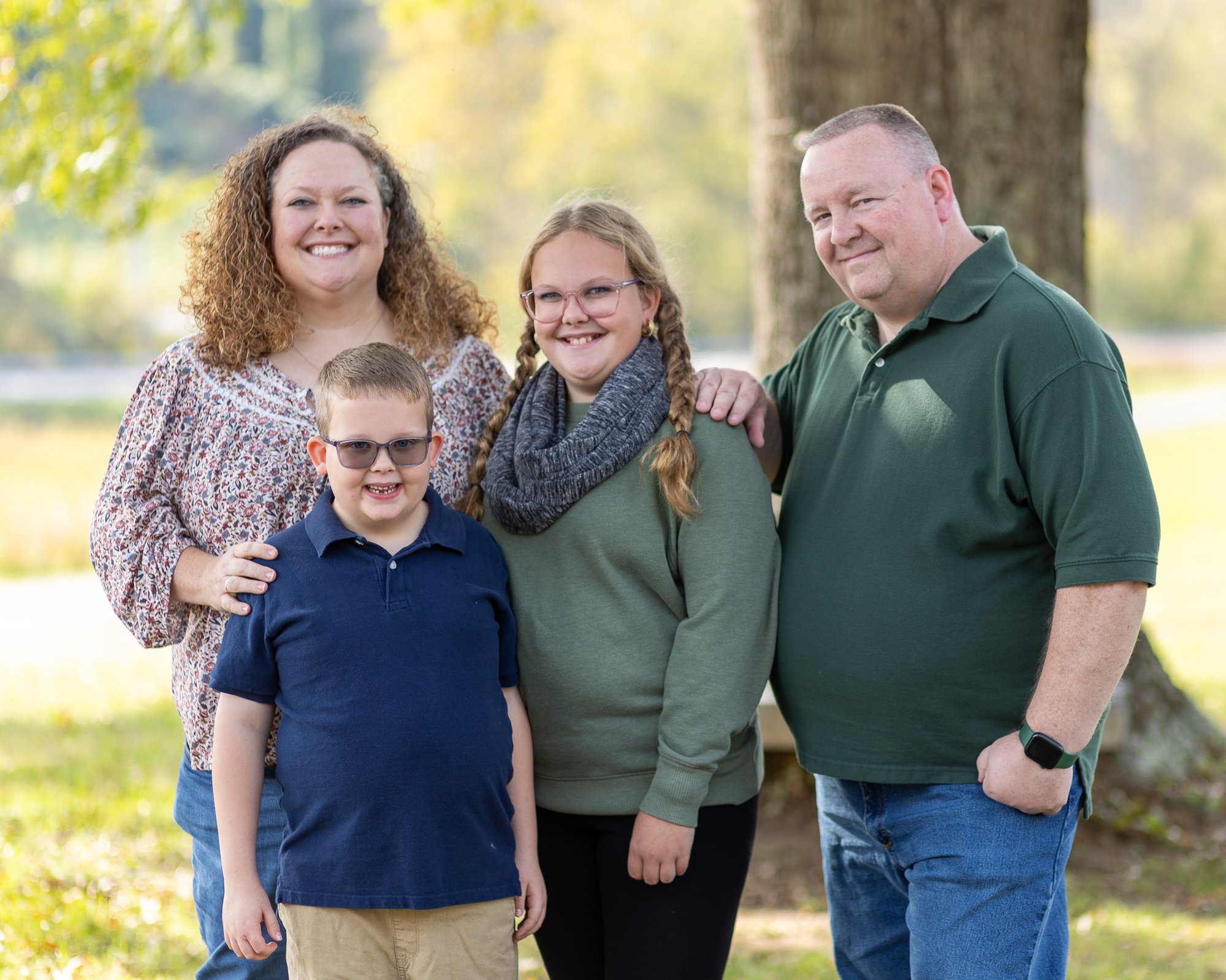 family of four outdoors