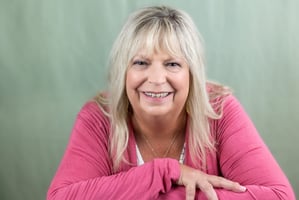 woman with a relaxed smile and pose