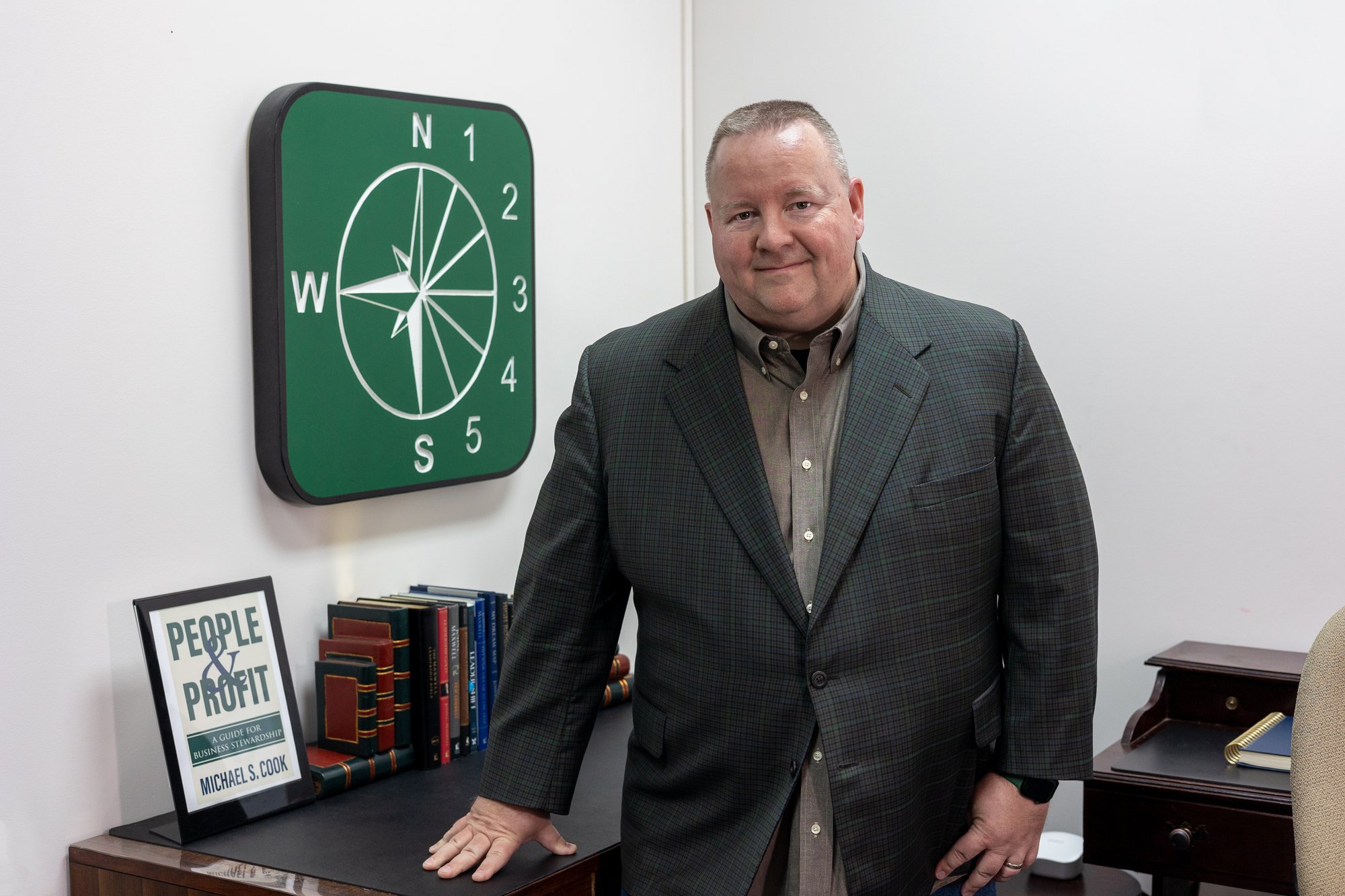 business man standing in his office