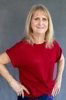 confident woman in red top