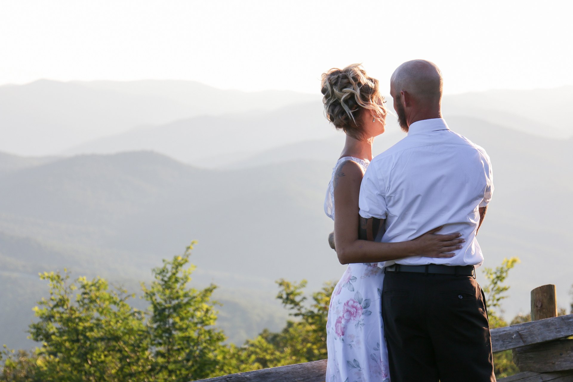 Post-wedding Bride Groom overlooking valley