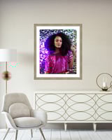 framed portrait on the wall