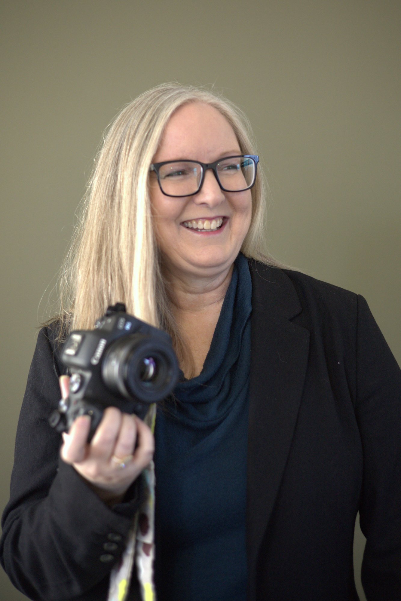 photographer Maggie McCanna with camera