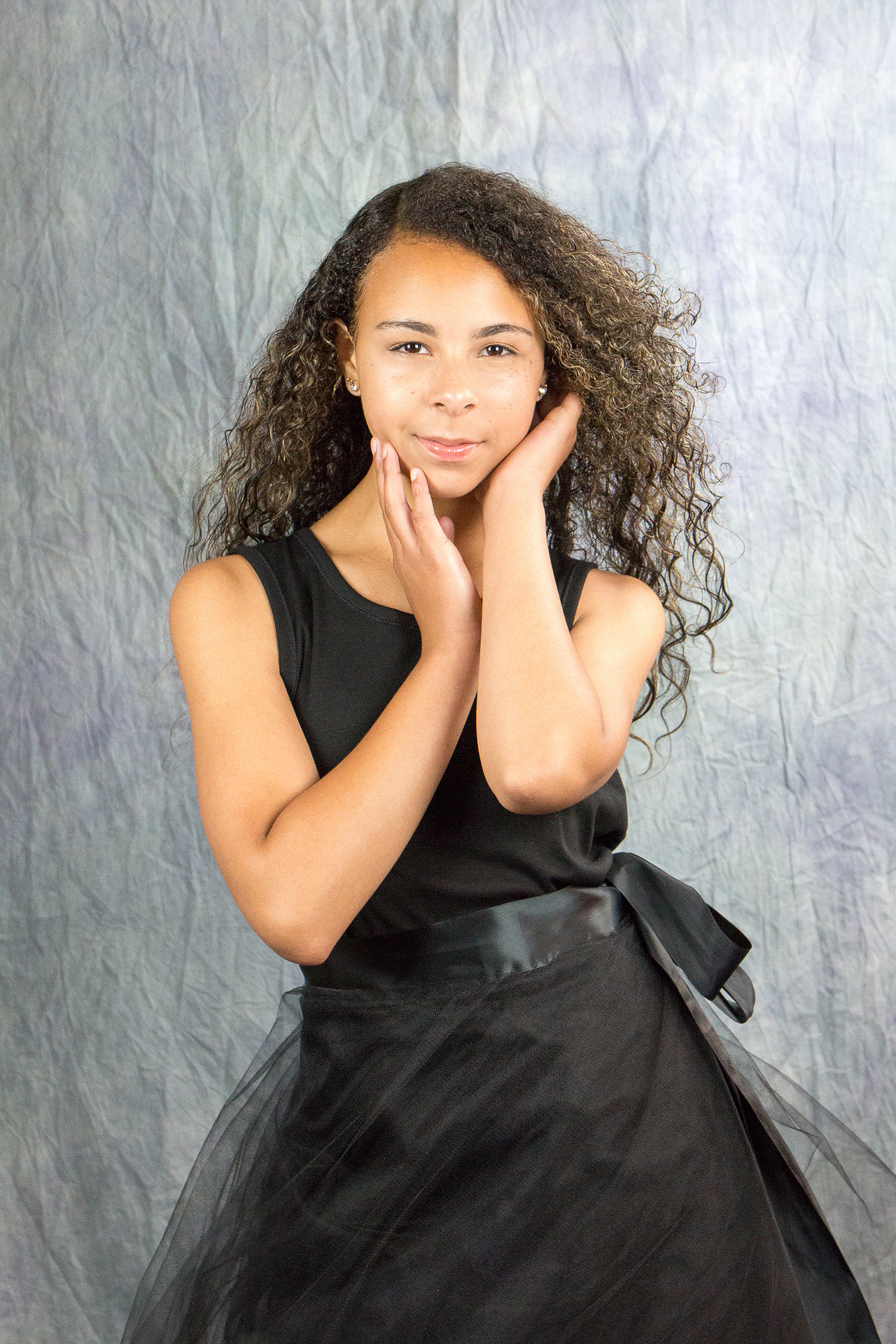 windblown model sweet sixteen in black dress