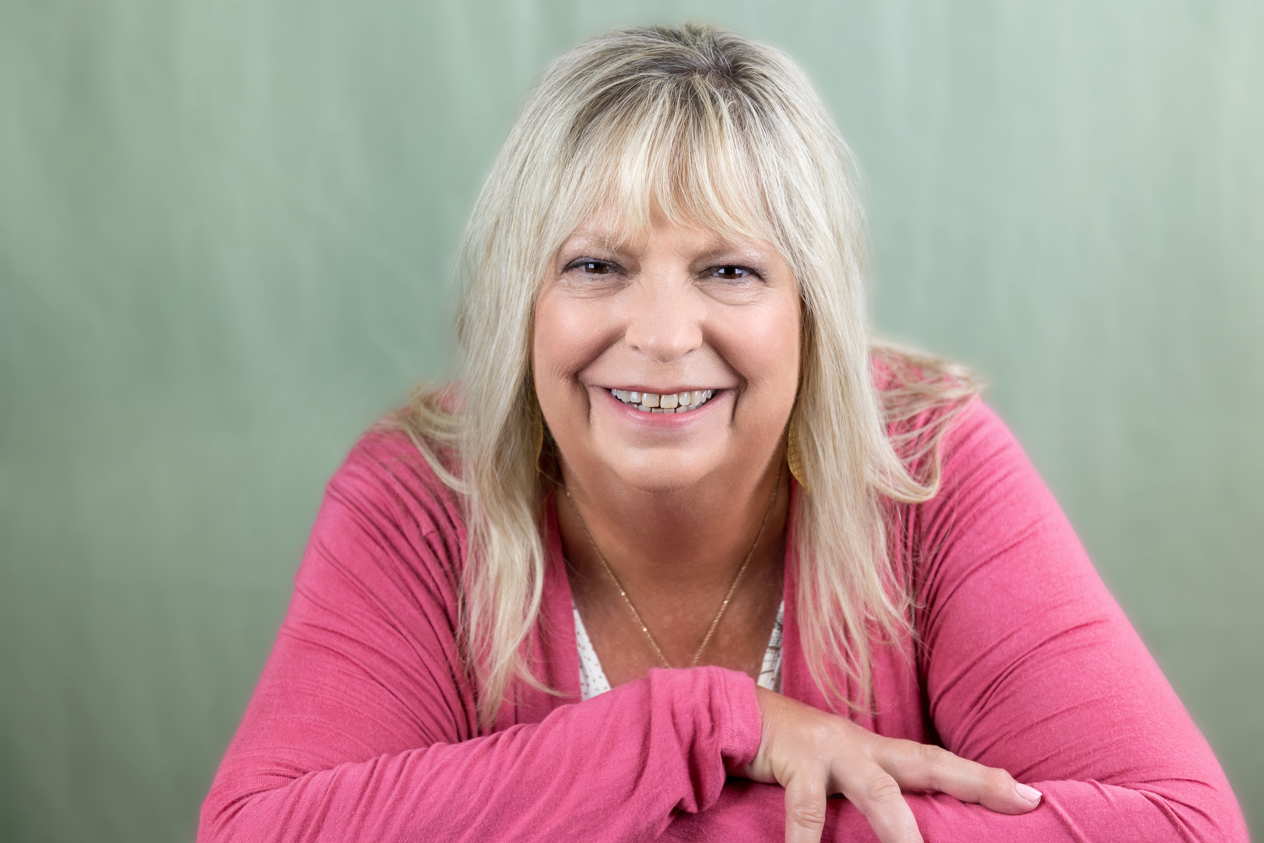 woman with a relaxed smile and pose