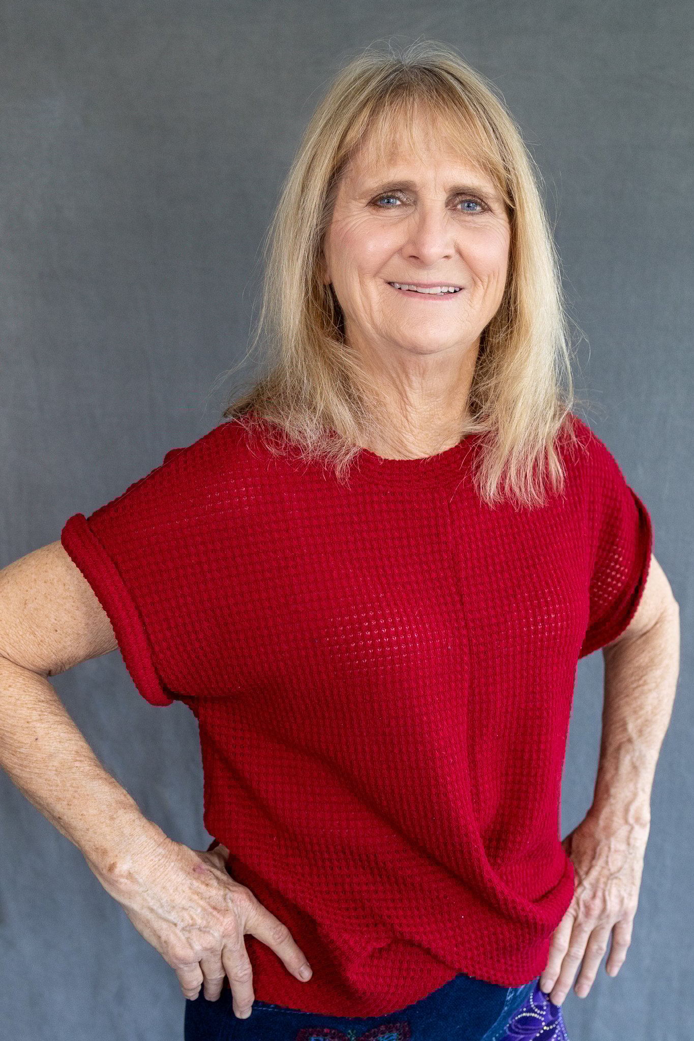 confident woman in red top